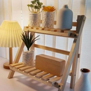 استاند خشب شيك جدا 😍😍 🔹 سلم ديكور دورين تحفه 🔹 رف خشبي للديكور والتخزين 🔹 منظم دورين عملي جدا 🔹 متعدد الاستخدامات 👈 في المطبخ لبرطمانات التوابل والبقوليات لتنظيم الرخامه واستغلال المساحة🫙🫙 👈 في غرف النوم للهدايا والتحف والشموع والمكياج 🕯🕯 👈في غرفة المعيشة والمكتب كرف مكتبي لتنظيم الكتب 📚📚 👈كديكور تحفة لوضع الزهور 🪴🪴 🔹الخامة خشب موسكي نمرة1 🪵🪵 🔹 قابل للطي والفتح بسهوله 👍👍 🔹 لا يأخذ مساحه في التخزين 🔹 المقاسات موضحه على الصورة